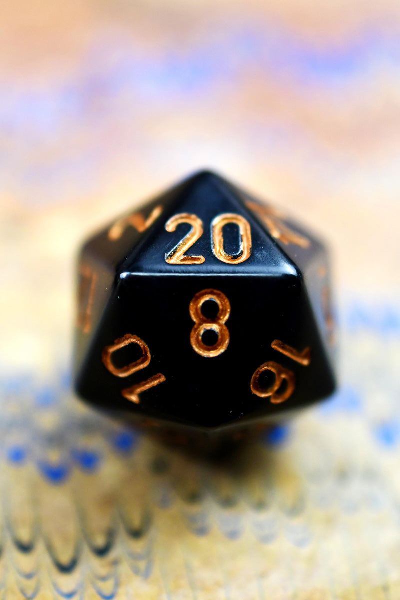 Chessex Dice Set - Black/Gold Opaque™️