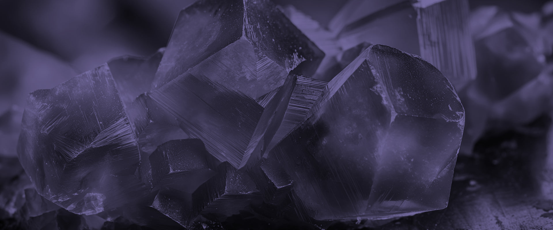 A very close up image of amethyst crystal texture